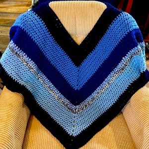 Crocheted poncho. Neck to point is 24 “